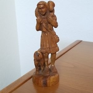Carved wooden sheep herder.